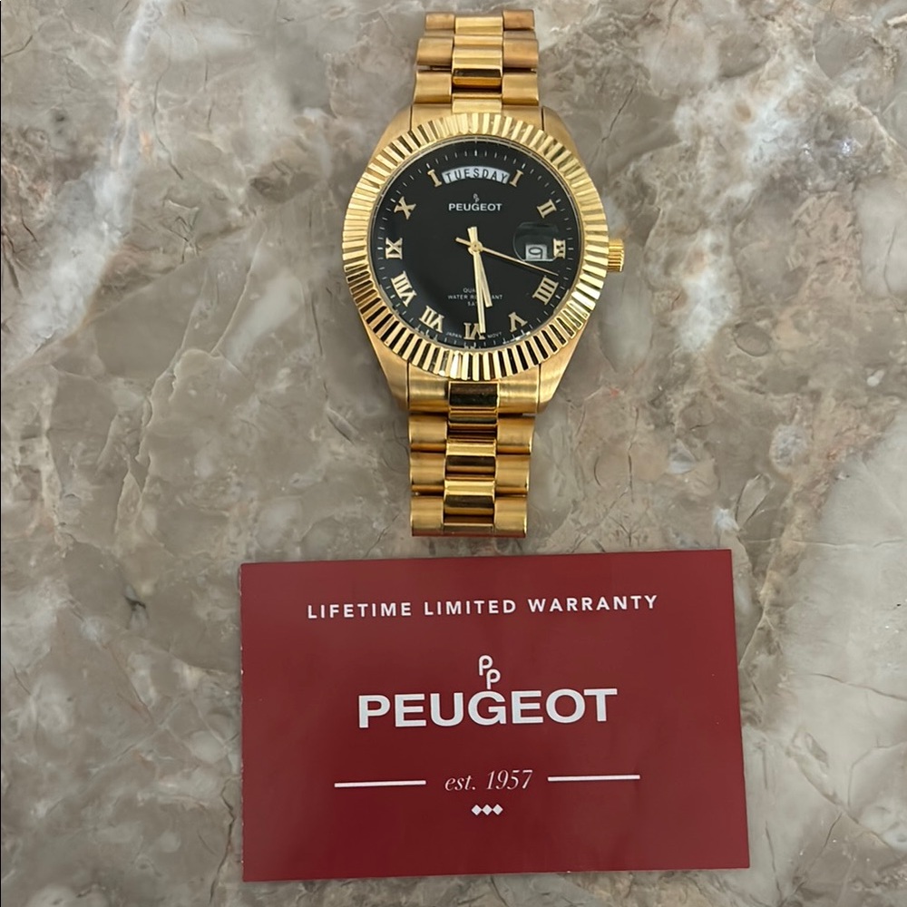 Peugeot Gold Watch with Black Face